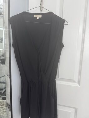 Anthropologie Black Sleeveless Faux-Wrap Romper with Pockets and Elastic Waist